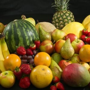 red apples and yellow round fruits